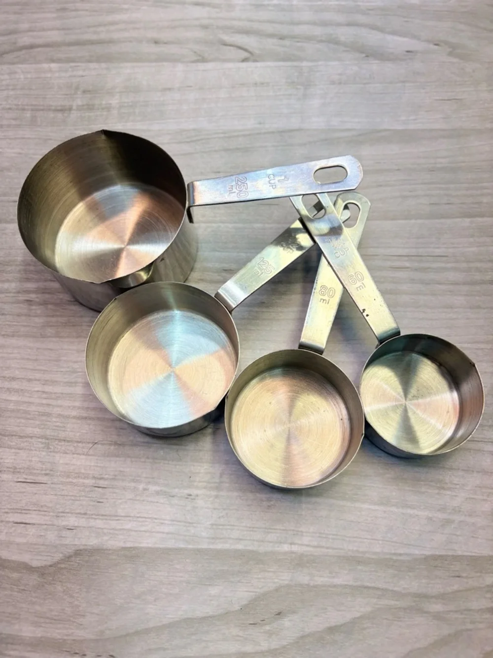 World Market Metal Brass Tone Stainless Steel Measuring Cups Set